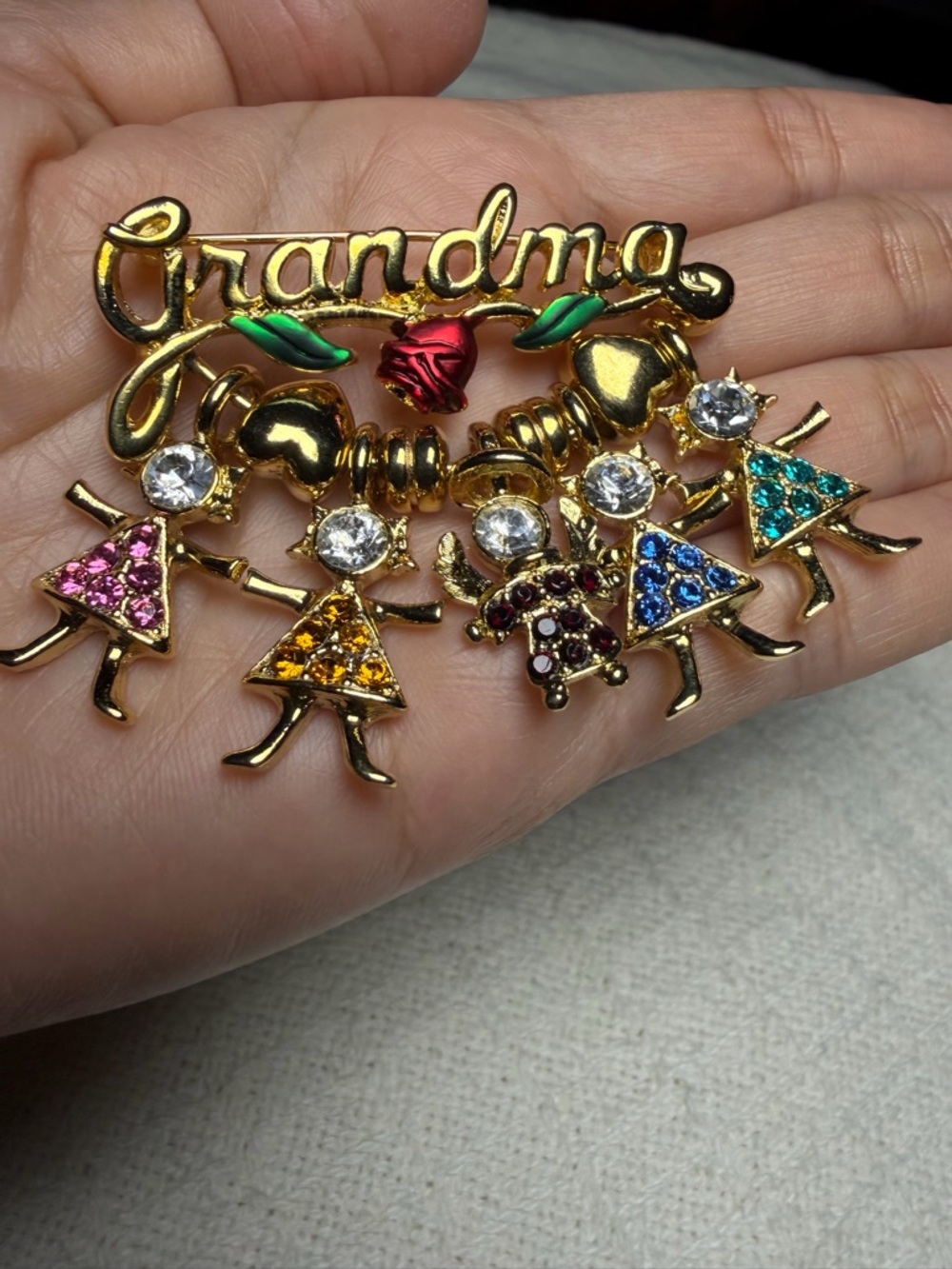 Vintage Gold Toned KIS Grandma Brooch with Dangling Charm fashion jewelry.